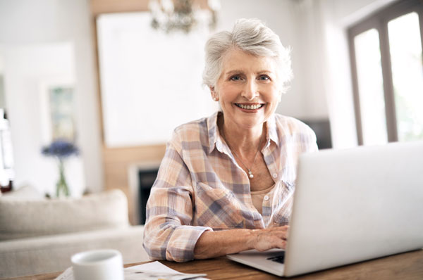 Portrait of woman with laptop